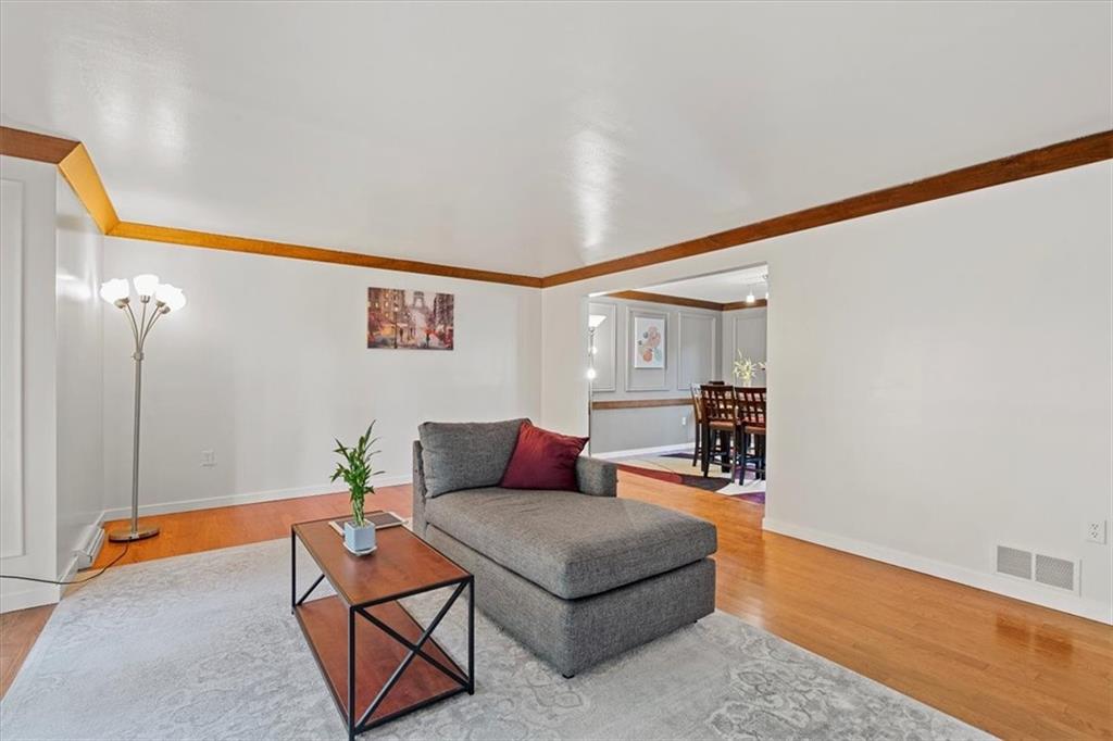 2239 Old Washington Road Pittsburgh, PA 15241 - Photo 13 of 37 a living room with furniture and a wooden floor
