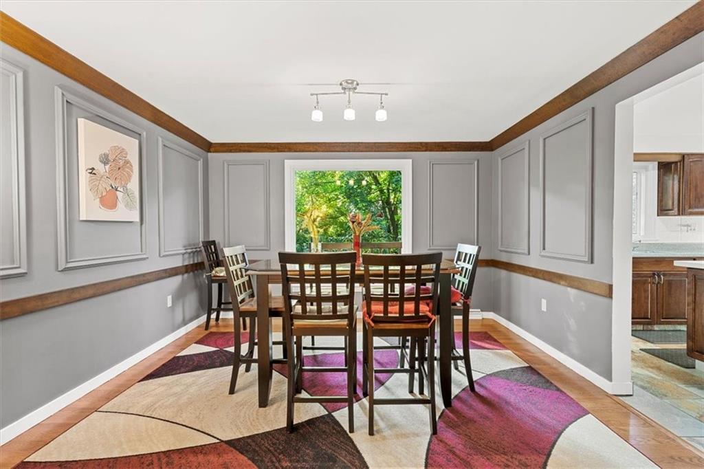 2239 Old Washington Road Pittsburgh, PA 15241 - Photo 14 of 37 a view of a dining room with furniture window and wooden floor