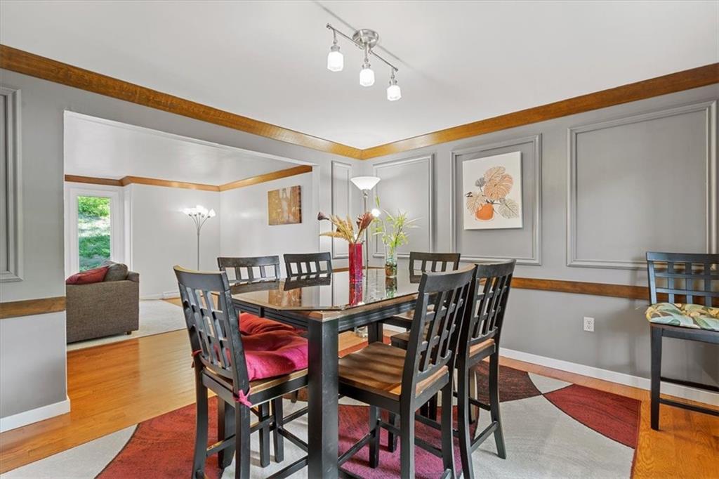 2239 Old Washington Road Pittsburgh, PA 15241 - Photo 15 of 37 a view of a dining room with furniture and wooden floor