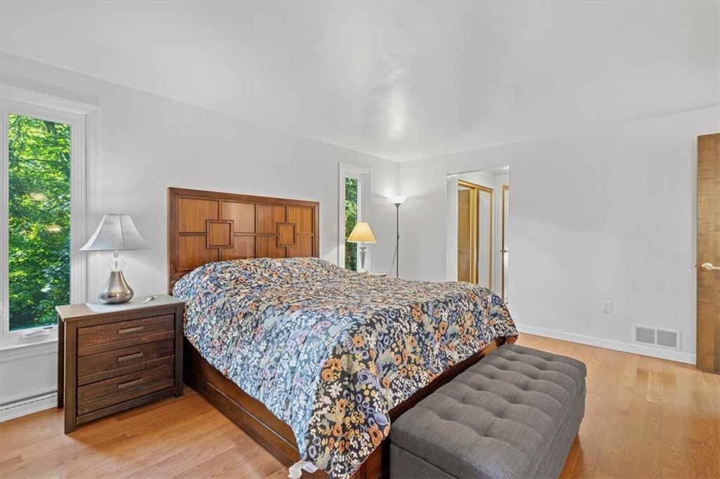 2239 Old Washington Road Pittsburgh, PA 15241 - Photo 25 of 37 a bedroom with a large bed and a large window