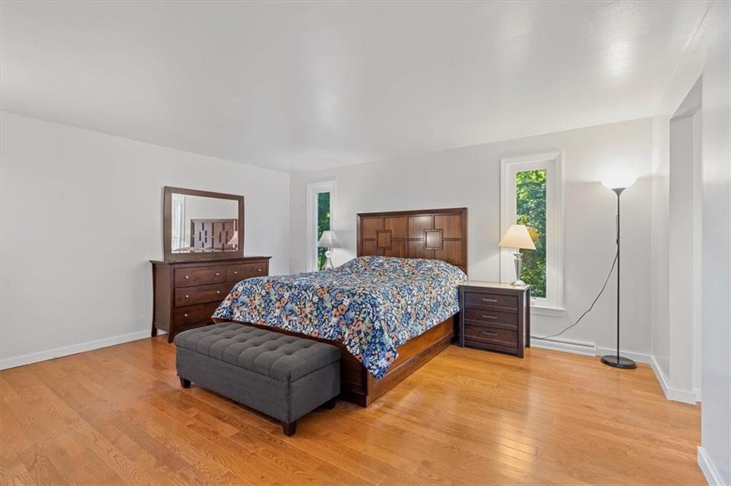 2239 Old Washington Road Pittsburgh, PA 15241 - Photo 26 of 37 a bedroom with a large bed and a couch