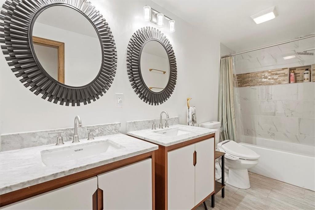 2239 Old Washington Road Pittsburgh, PA 15241 - Photo 28 of 37 a bathroom with a double vanity sink and a mirror