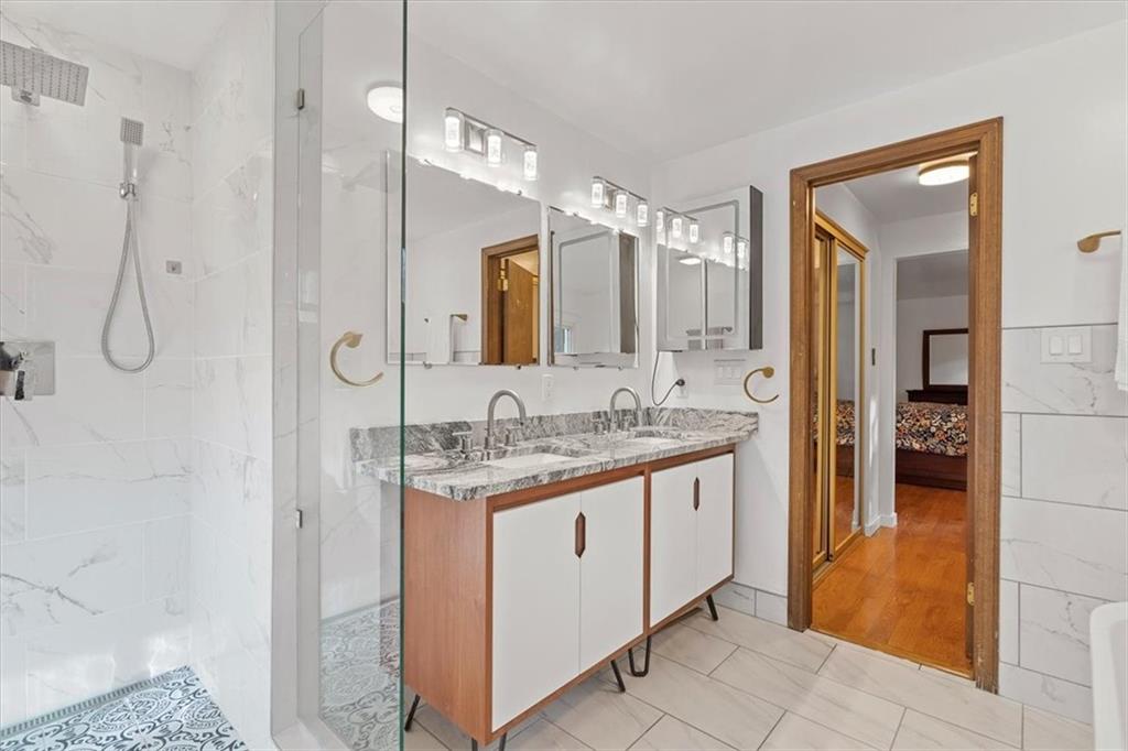 2239 Old Washington Road Pittsburgh, PA 15241 - Photo 31 of 37 a bathroom with a granite countertop sink and a mirror