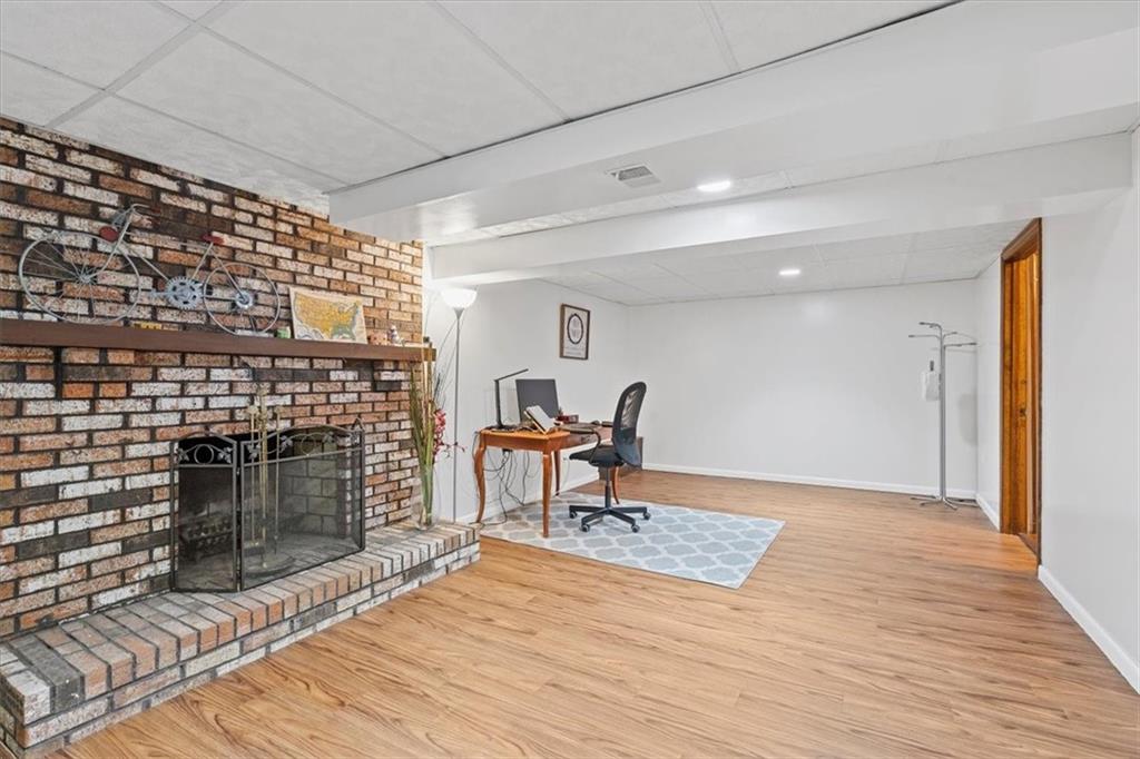 2239 Old Washington Road Pittsburgh, PA 15241 - Photo 36 of 37 a living room with furniture and a fireplace