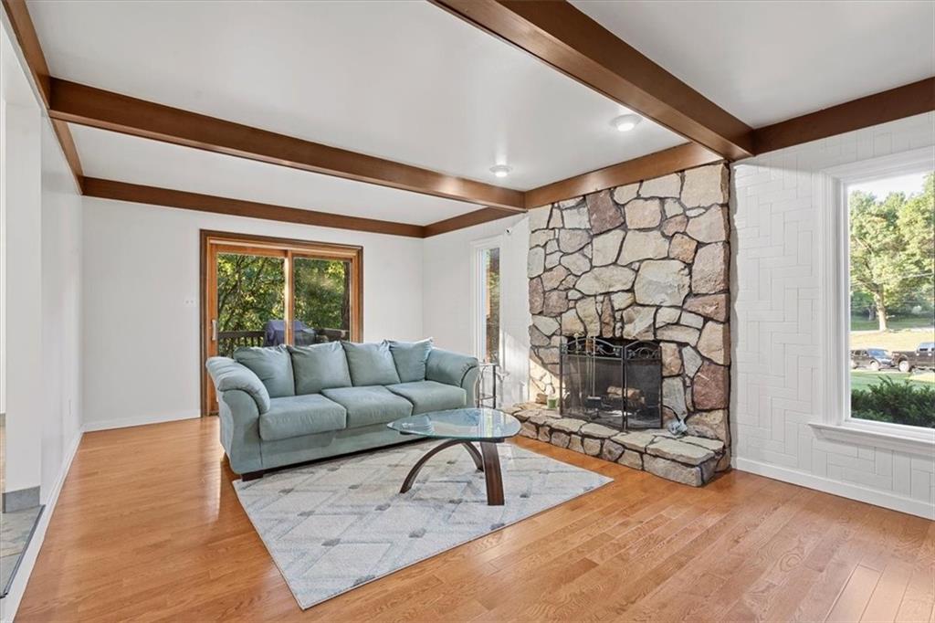 2239 Old Washington Road Pittsburgh, PA 15241 - Photo 8 of 37 a living room with furniture and a fireplace