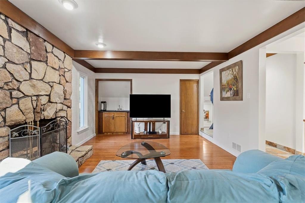 2239 Old Washington Road Pittsburgh, PA 15241 - Photo 10 of 37 a living room with furniture and a flat screen tv