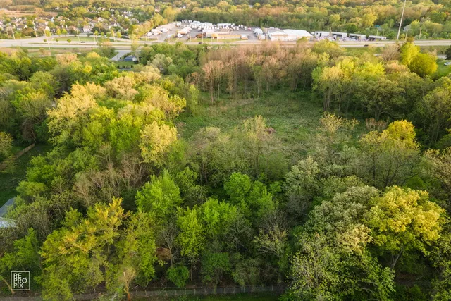 a view of lake with green space