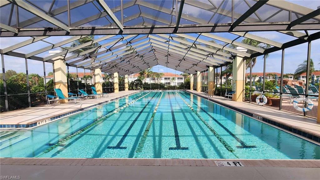 23821 Marbella Bay Road, Unit 102 Estero, FL 34135 - Photo 21 of 30 a view of porch with a swimming pool