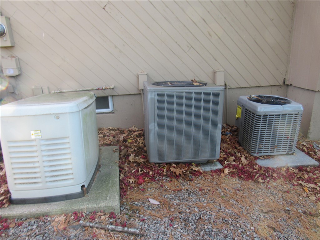 93 Elena Street Cranston, RI 02920 - Photo 38 of 40 Generator and a/c condensers