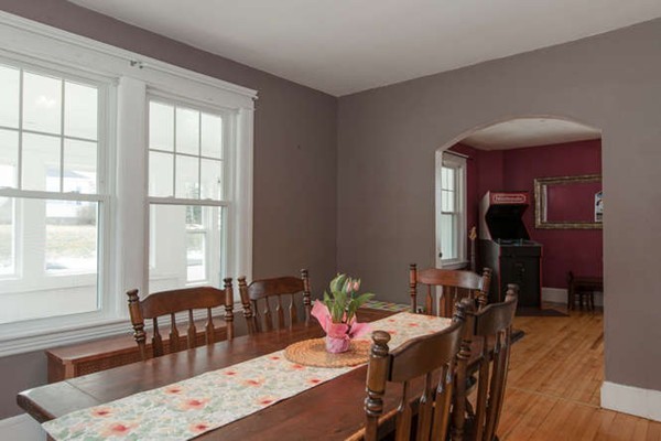 97 Bay State Road Worcester, MA 01606 - Photo 11 of 26 a view of a dining room with furniture window and wooden floor