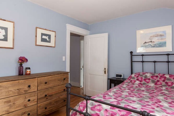 97 Bay State Road Worcester, MA 01606 - Photo 16 of 26 a bedroom with a bed and a dresser in it