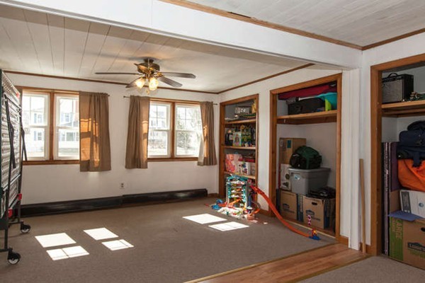 97 Bay State Road Worcester, MA 01606 - Photo 23 of 26 a living room with hard wood floors and a window