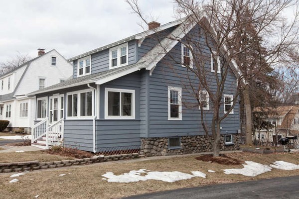 97 Bay State Road Worcester, MA 01606 - Photo 3 of 26 a front view of a house with a yard