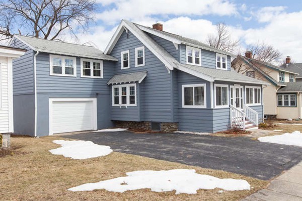 97 Bay State Road Worcester, MA 01606 - Photo 4 of 26 a front view of a house with a yard