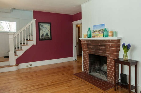 97 Bay State Road Worcester, MA 01606 - Photo 6 of 26 a living room with furniture and a fireplace