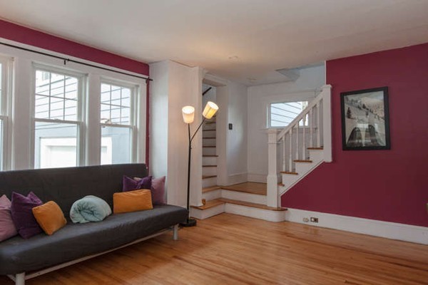 97 Bay State Road Worcester, MA 01606 - Photo 7 of 26 a living room with furniture and a large window