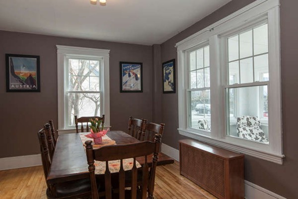 97 Bay State Road Worcester, MA 01606 - Photo 10 of 26 a view of a dining room with furniture window and wooden floor