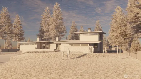a view of a house with a snow in the background