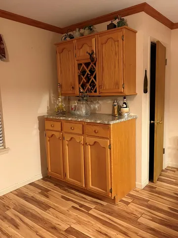 a view of a closet and mirror