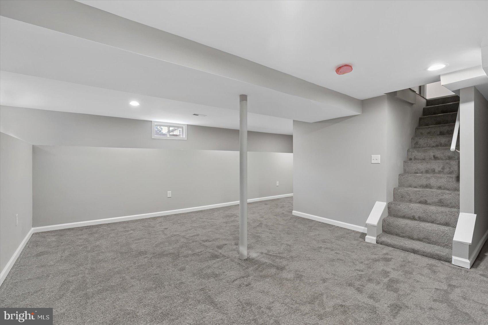8217 Bullneck Road Baltimore, MD 21222 - Photo 37 of 41 a view of an empty room with a staircase