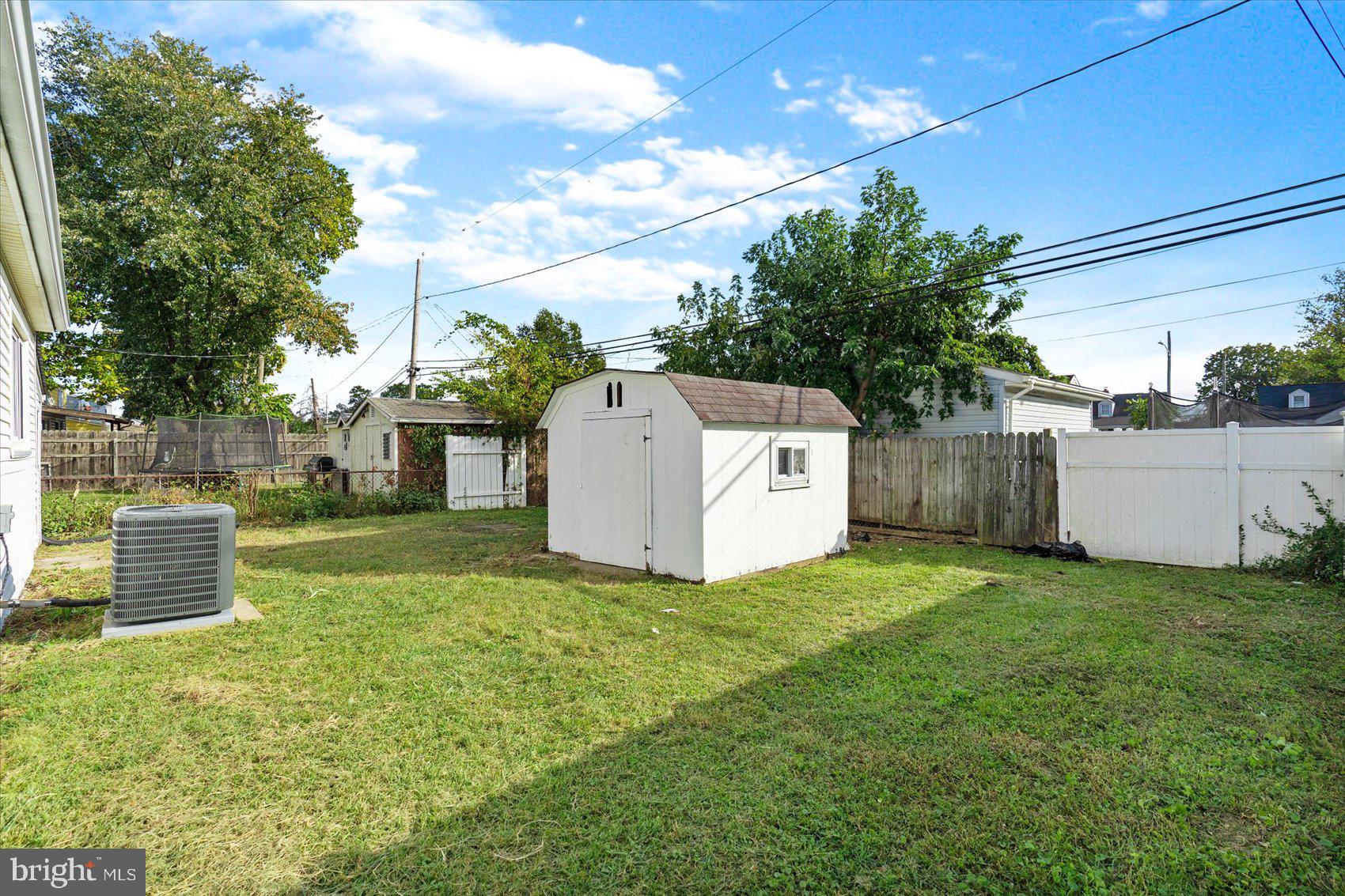 8217 Bullneck Road Baltimore, MD 21222 - Photo 40 of 41 a view of a tiny house with a yard