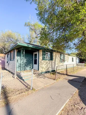 a front view of a house with a patio