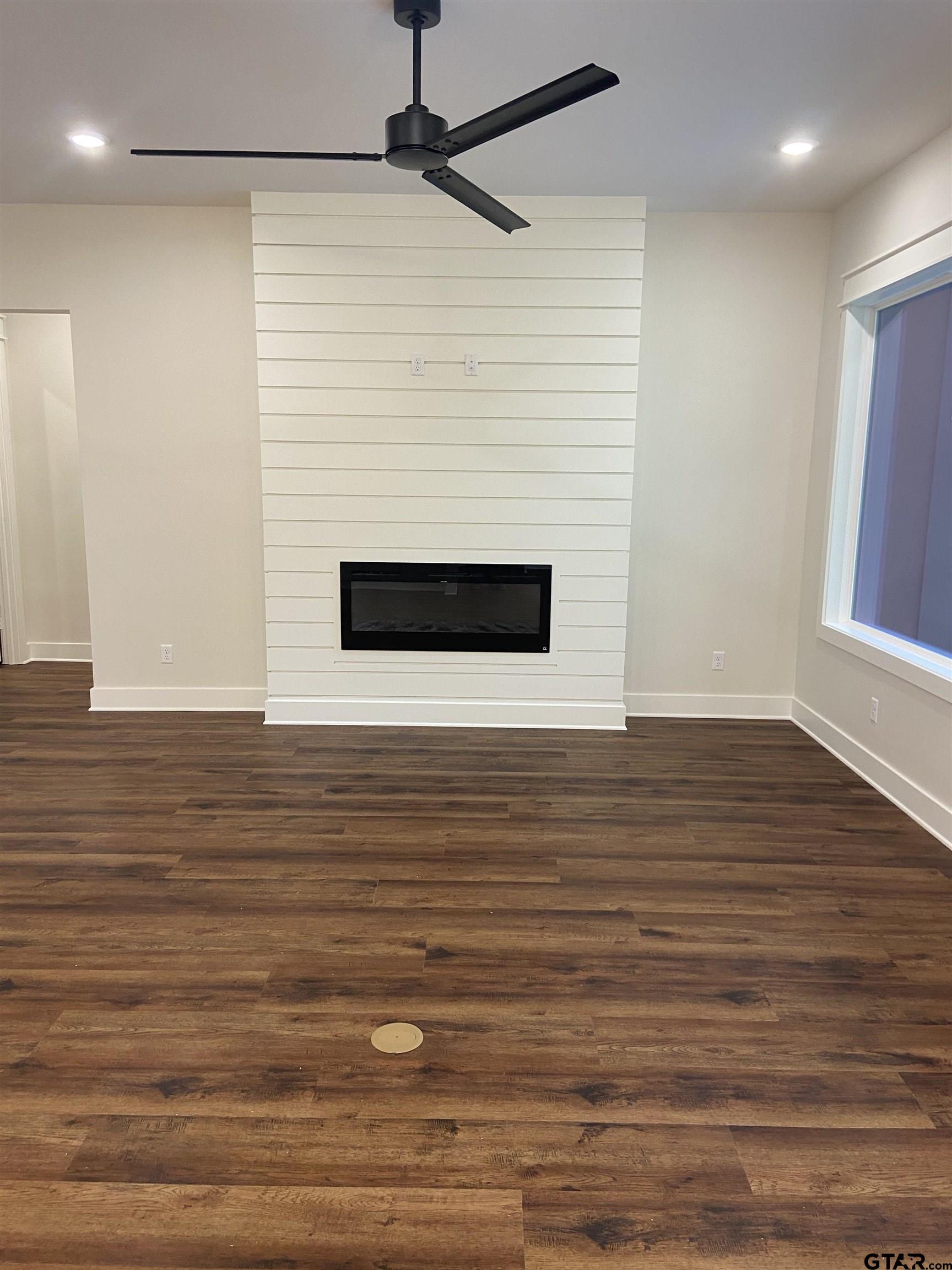 18690 Windjammer Place Flint, TX 75762 - Photo 14 of 47 a view of a livingroom with wooden floor