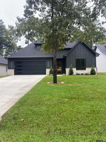 a house view with a garden space