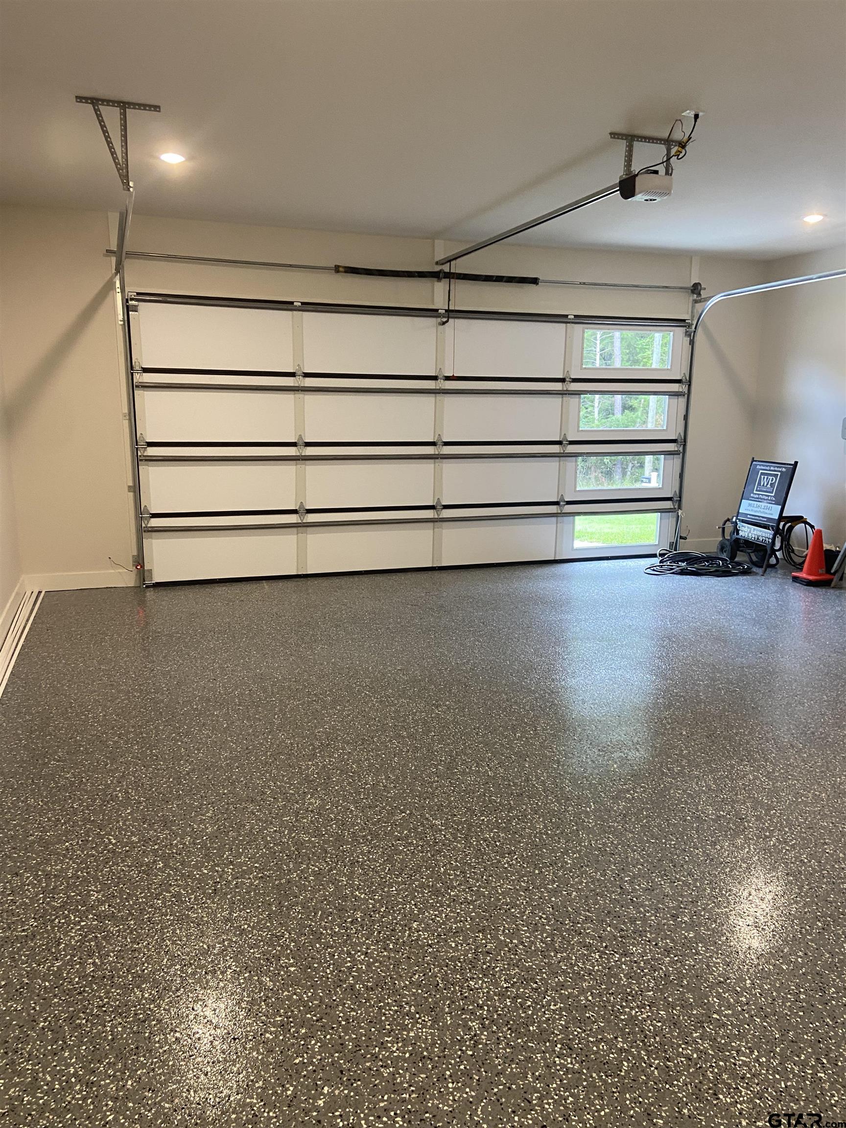 18690 Windjammer Place Flint, TX 75762 - Photo 36 of 47 a view of a room with a flat screen tv