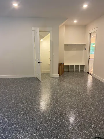 an empty room with windows