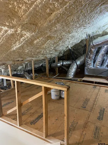 a view of balcony with two chairs