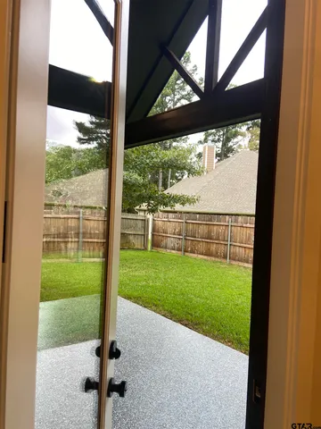 a view of a yard with a porch