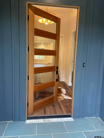 a view of a door and wooden door