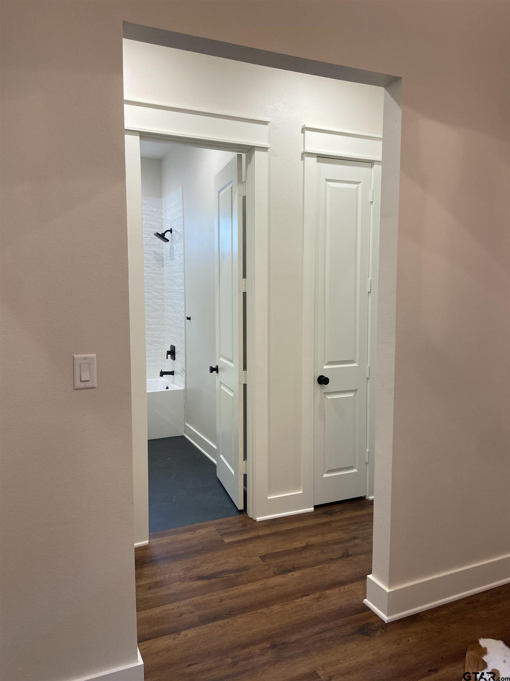 18690 Windjammer Place Flint, TX 75762 - Photo 9 of 47 a view of a bathroom with wooden floor