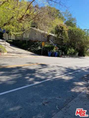a street view of residential houses with street