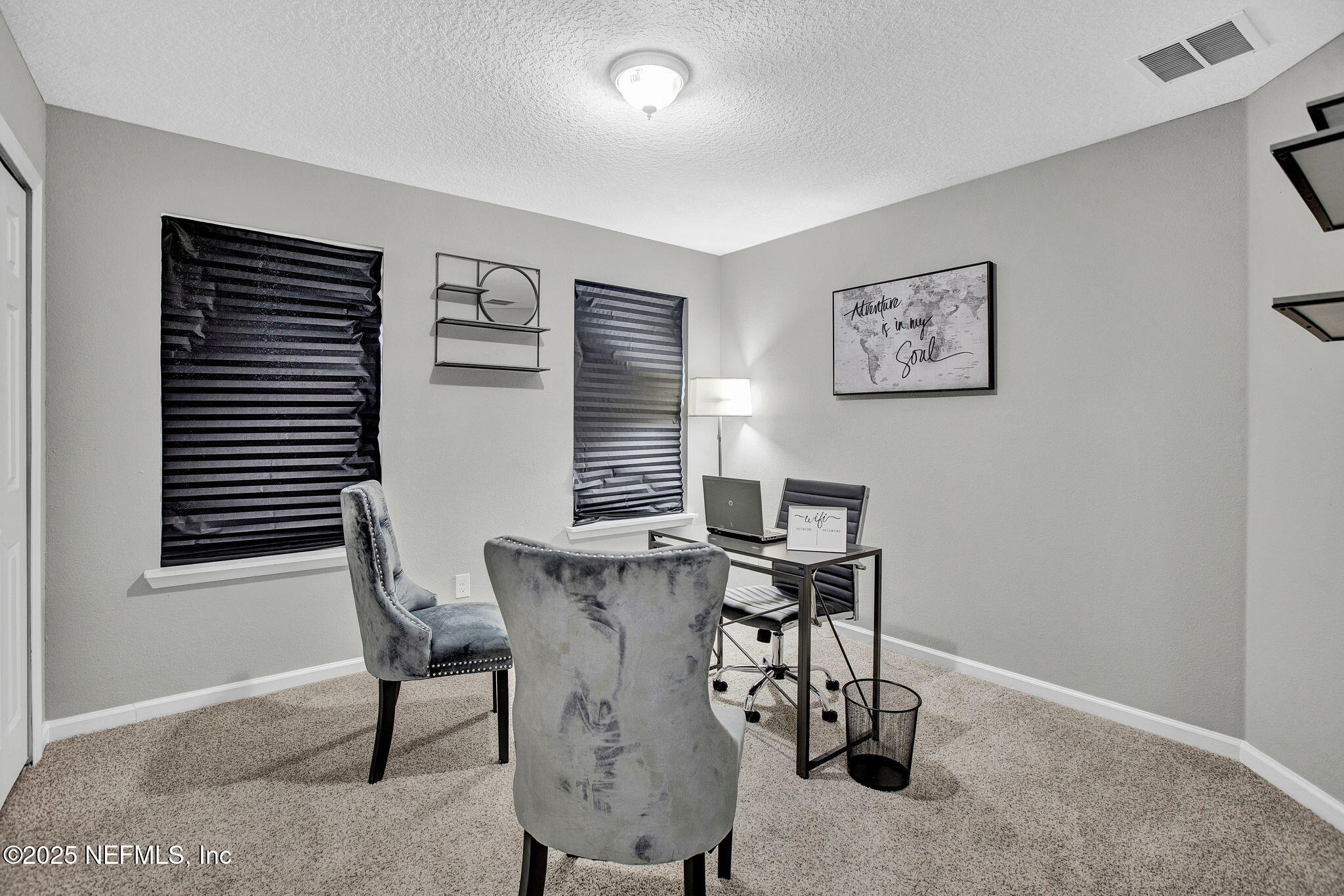 7442 Richardson Road Jacksonville, FL 32209 - Photo 13 of 15 a view of a workspace with furniture and a window
