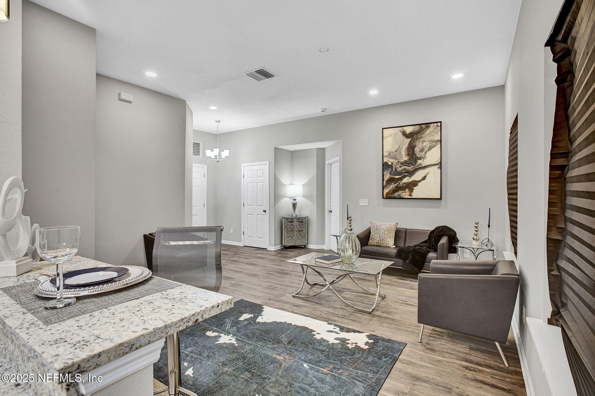 7442 Richardson Road Jacksonville, FL 32209 - Photo 5 of 15 a living room with furniture a couch and wooden floor