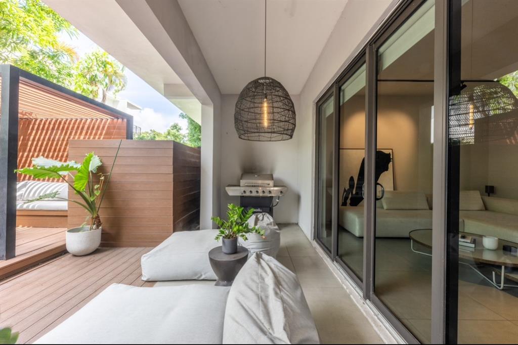 1635 Southwest 19th Terrace Miami, FL 33145 - Photo 18 of 20 a front view of a house with a potted plant