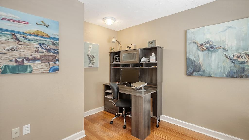 5968 Rachele Drive Sarasota, FL 34243 - Photo 13 of 55 a view of a workspace with furniture and wooden floor