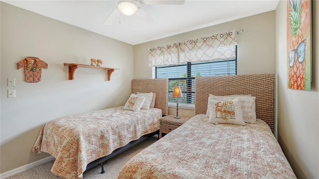 5968 Rachele Drive Sarasota, FL 34243 - Photo 36 of 55 a bedroom with bed and window