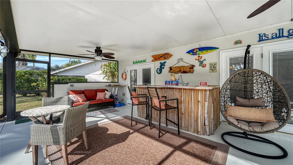 5968 Rachele Drive Sarasota, FL 34243 - Photo 48 of 55 a bedroom with furniture and a window