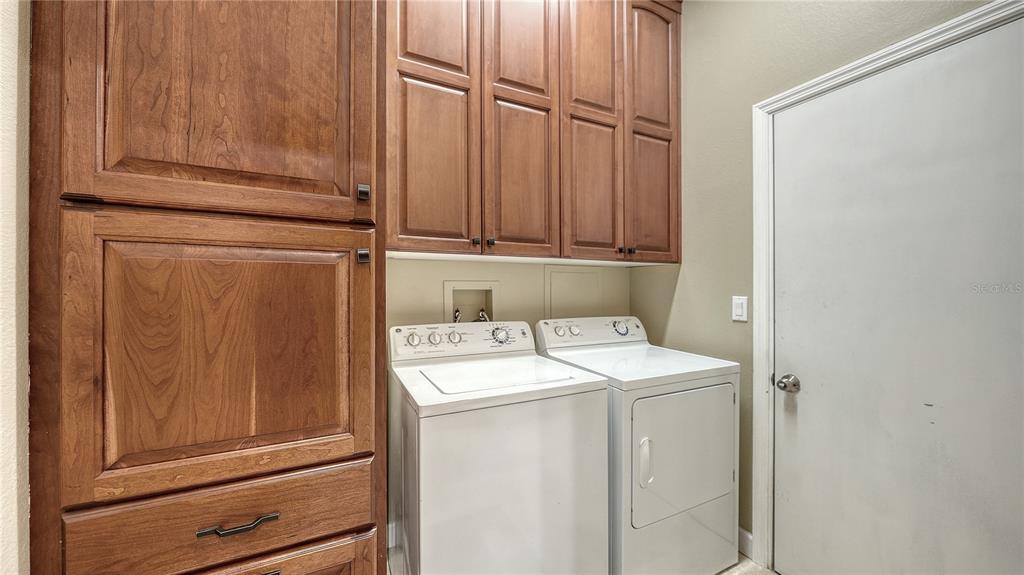 5968 Rachele Drive Sarasota, FL 34243 - Photo 52 of 55 a utility room with dryer and washer