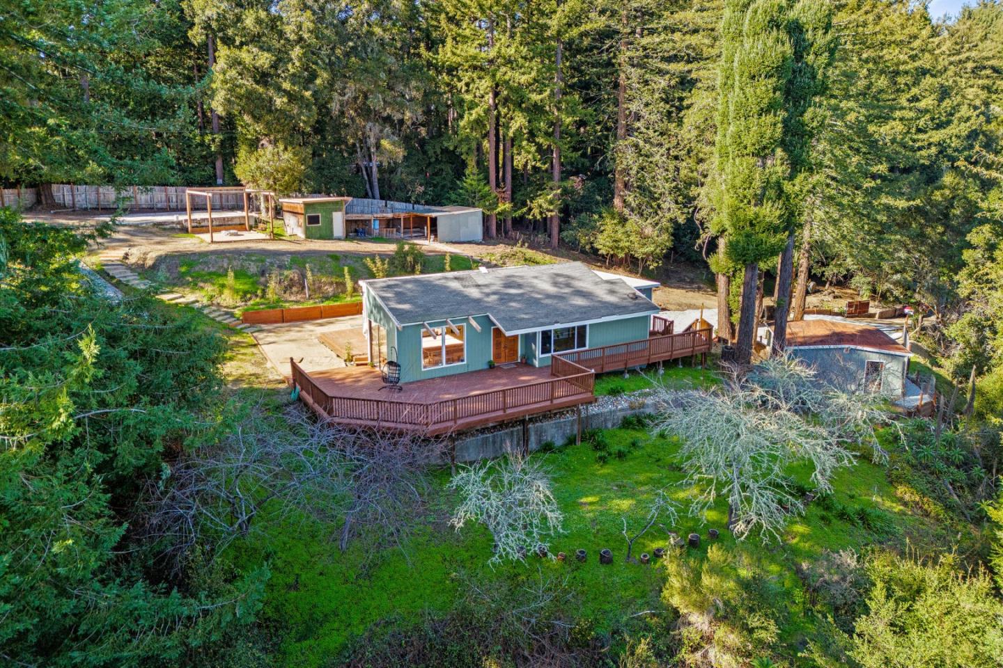 4900 Trout Gulch Road Aptos, CA 95003 - Photo 1 of 33 a view of a backyard with sitting area