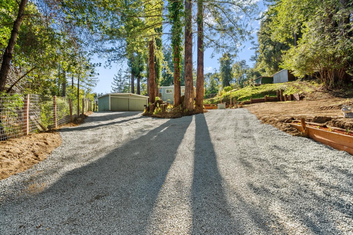 4900 Trout Gulch Road Aptos, CA 95003 - Photo 2 of 33 a view of a street with trees on both side of it
