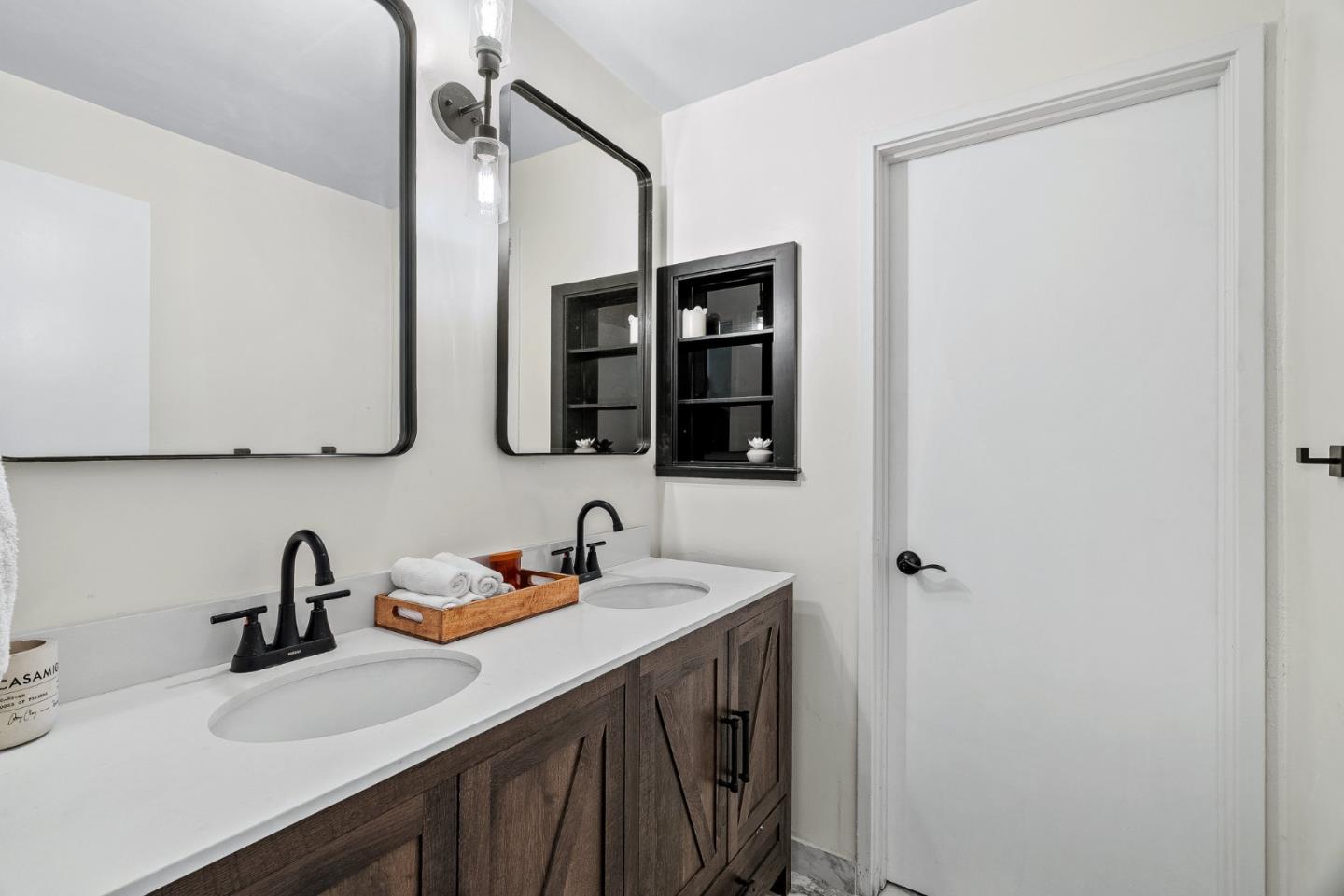4900 Trout Gulch Road Aptos, CA 95003 - Photo 21 of 33 a bathroom with a sink and a mirror