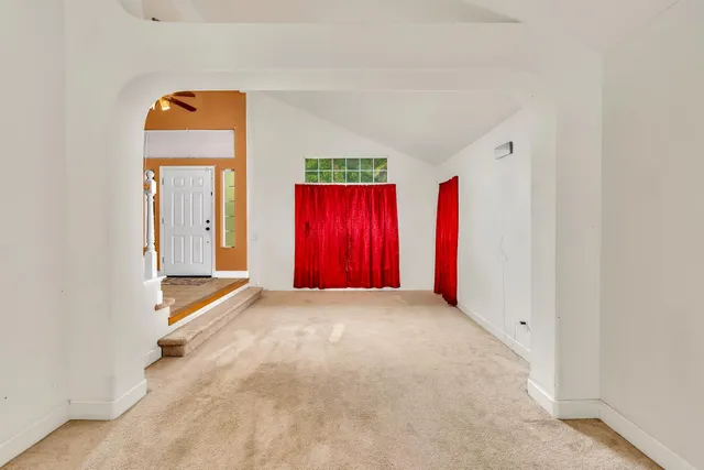 a kitchen that has a table and chairs in it