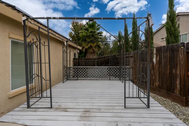 an aerial view of houses with outdoor space