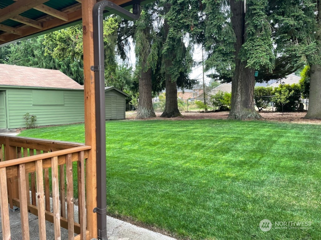 6930 East Cady Road Everett, WA 98203 - Photo 20 of 22 a view of a backyard with large trees