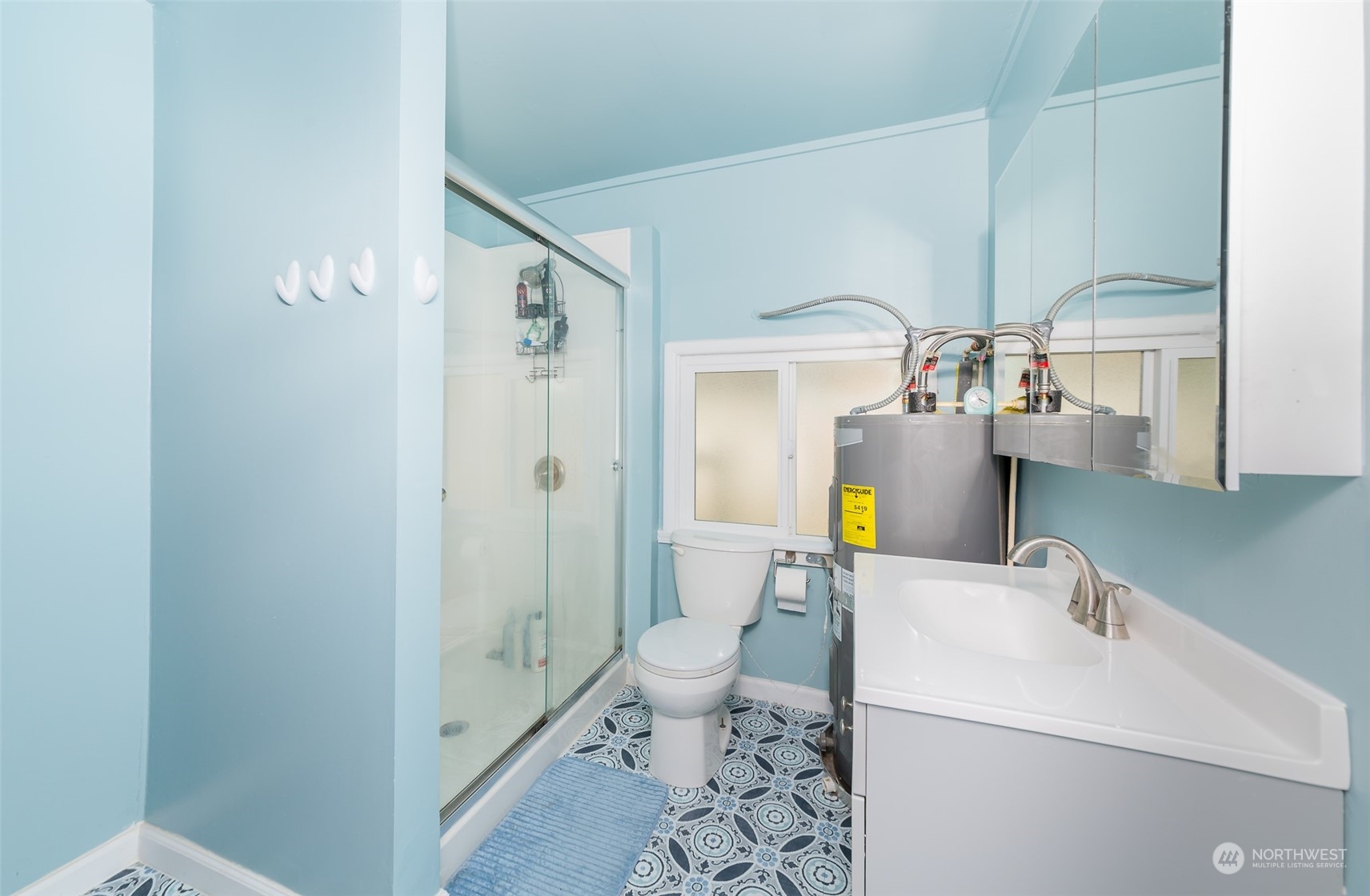 6930 East Cady Road Everett, WA 98203 - Photo 8 of 22 a bathroom with a sink a toilet and shower