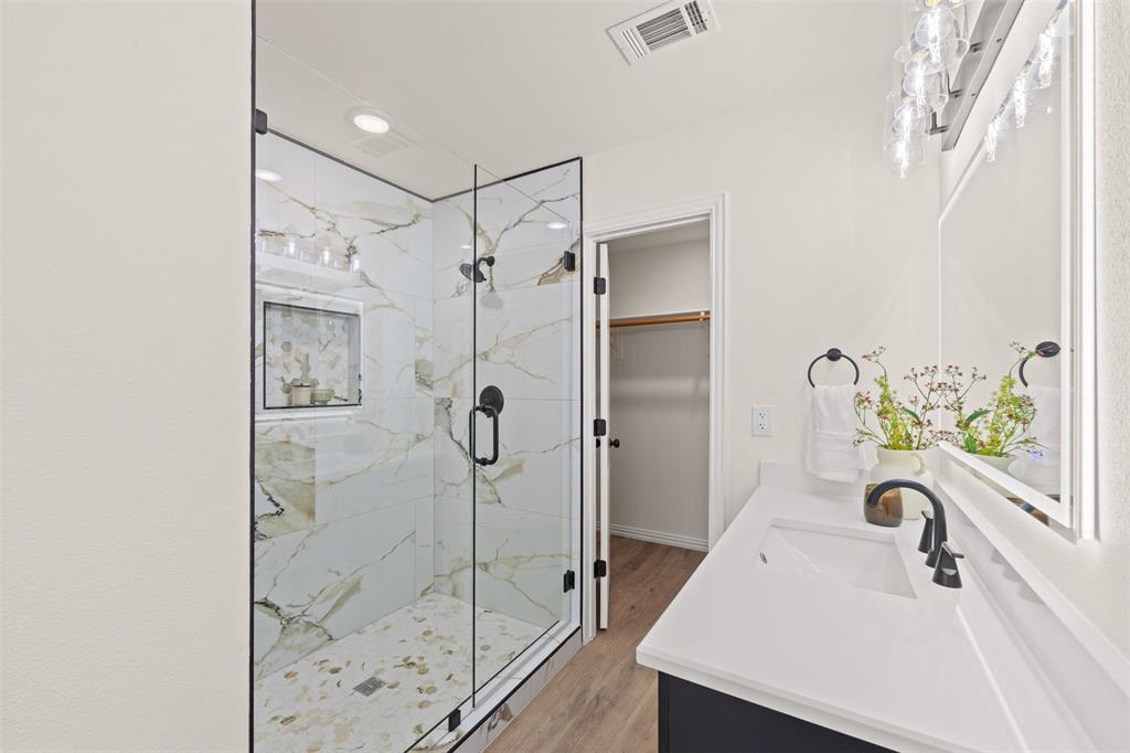 5860 Newt Patterson Road Mansfield, TX 76063 - Photo 22 of 40 Primary bathroom with dual vanity walk in closet